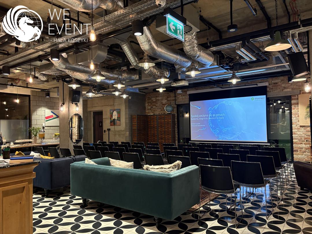 A presentation in the EVENT Room — a live event in the loft interior of Hala Koszyki